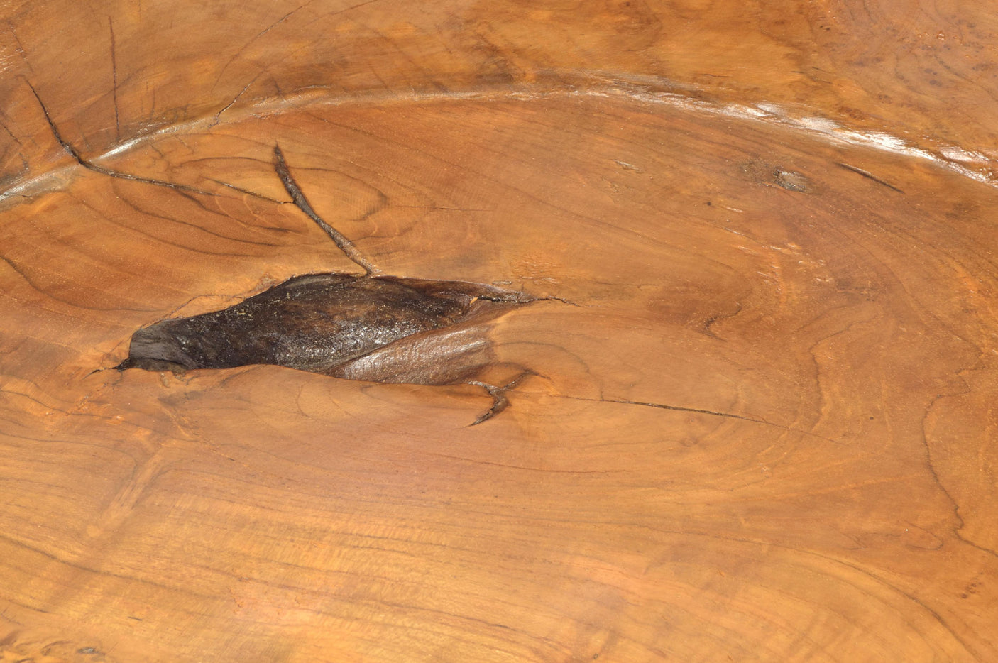 Close up of the teak root surface of a chair