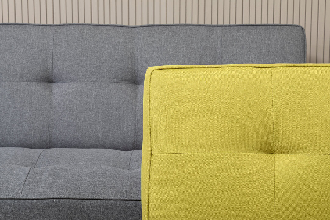 A grey sofa bed and yellow sofa bed