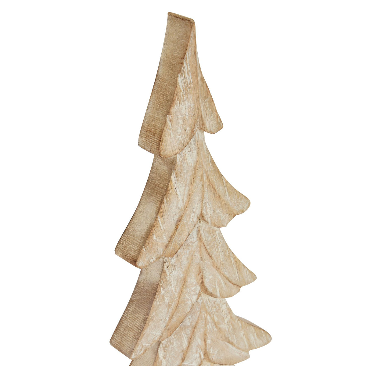 Close-up of the carved branches and whitewashed grain of the small tree