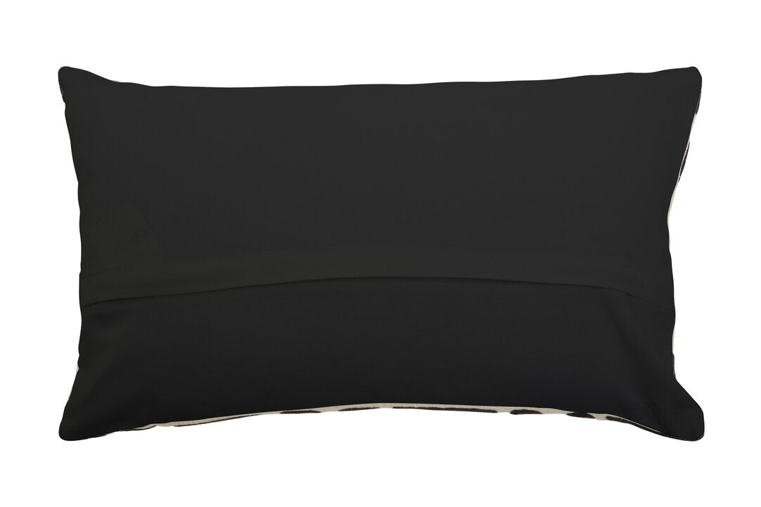 Plain black cotton back of the rectangular Elora Natural And Black Embroidered Cushion with a zip