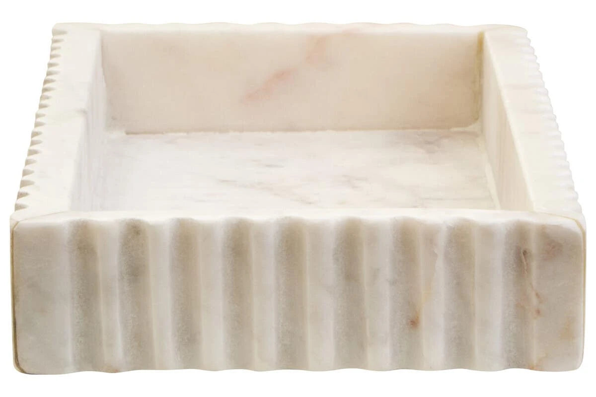 End view of the Vela White Marble Fluted Rectangular Tray, showing the inside of the tray and its pale veining.