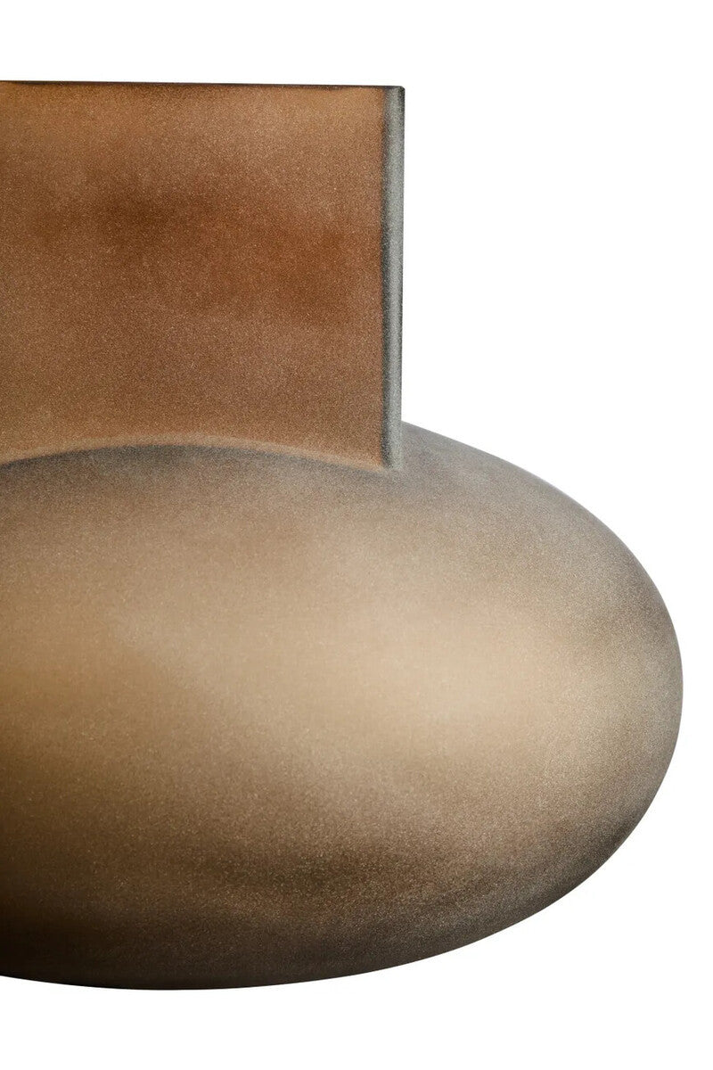 Close-up of a brown vase with a white background