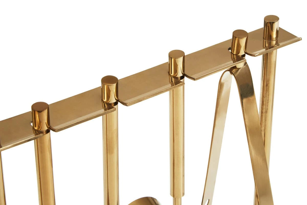 Close-up of the gold-finish hanging rail on the Loxley bar tool stand