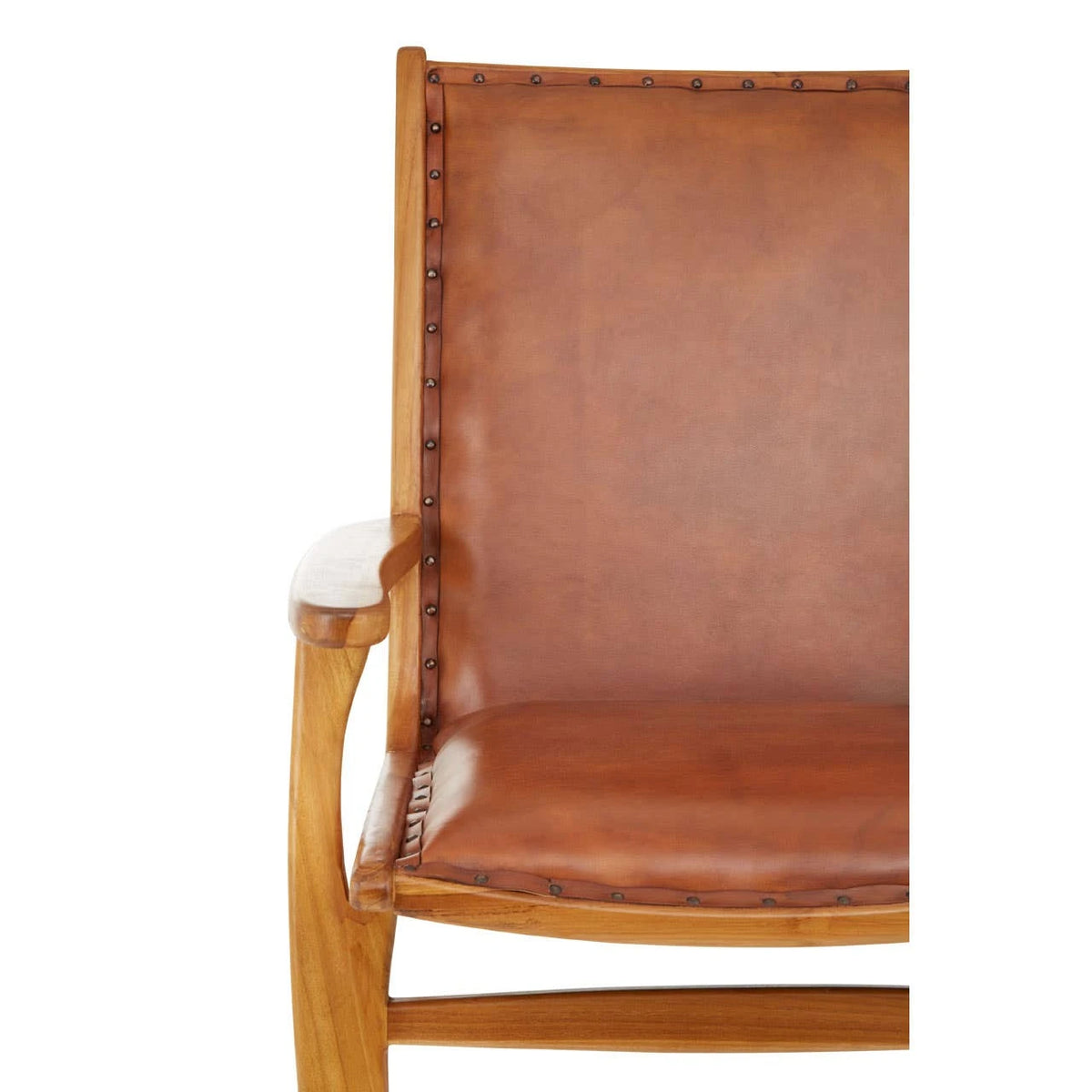 Close view of the tan leather seat and back of the Jakarta Chair with Stud Detail, with studs along the edge.