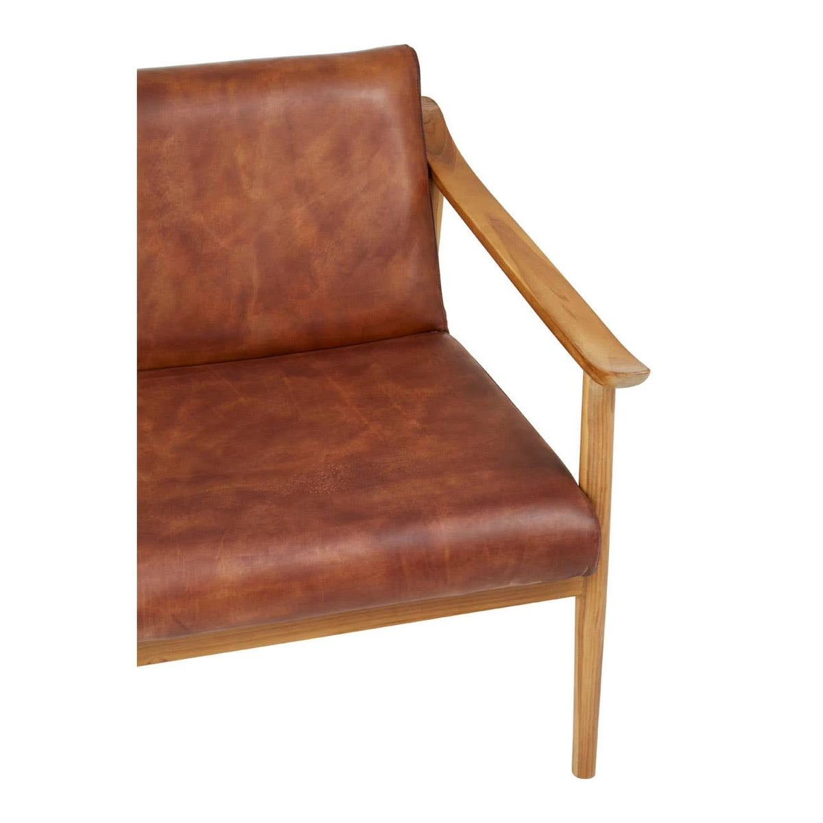 Close view of the mottled brown leather cushions and teak armrest of the Jakarta Natural Teak Armchair.