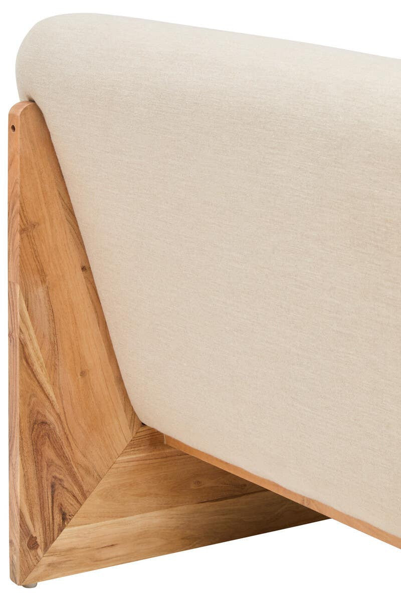 Back of a cream linen sofa with a wooden base