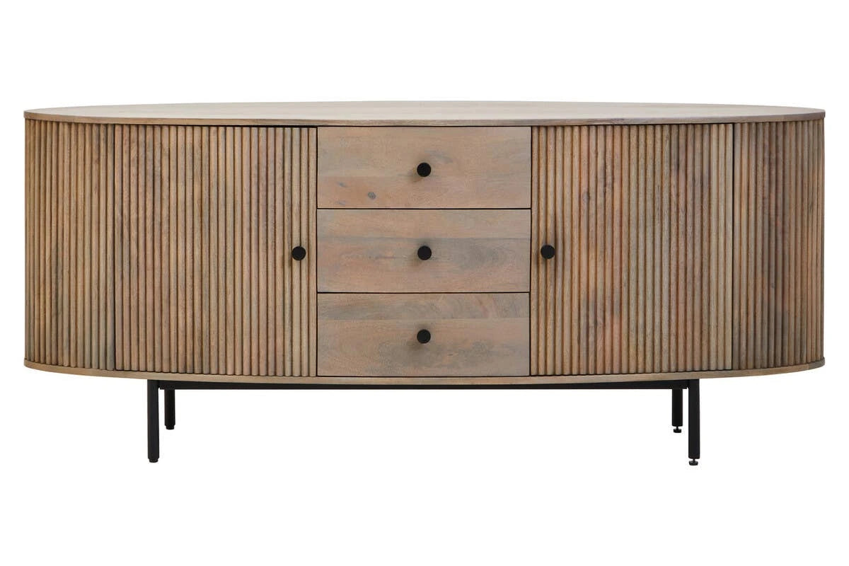 Front view of the Hawthorn Grey Oval Sideboard, with two reeded mango wood doors either side of three drawers, on black metal legs.