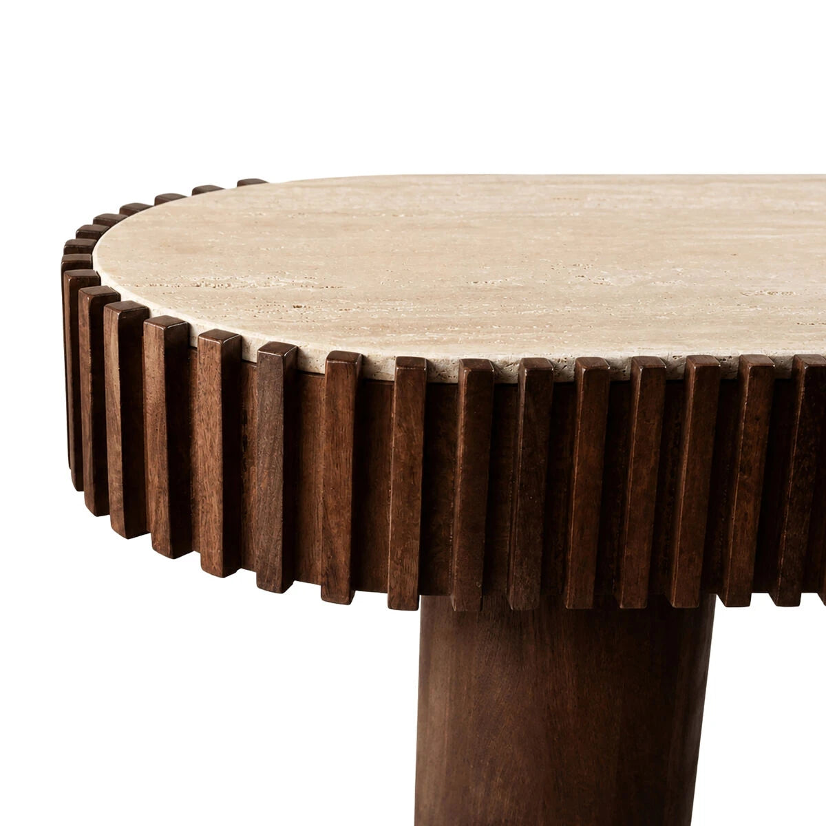 Close-up of the travertine top, ribbed edge and pillar leg on the Solmere console table