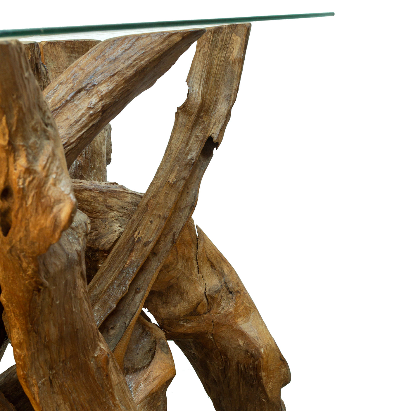 Close up of teak tree root lamp table with glass top on a white background