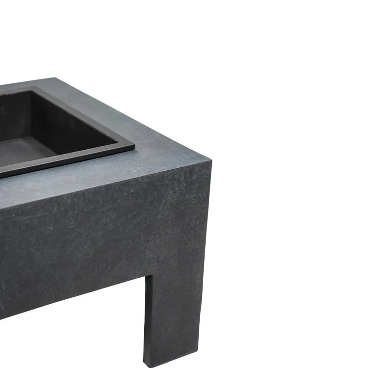 Black stone fire pit table on a white background