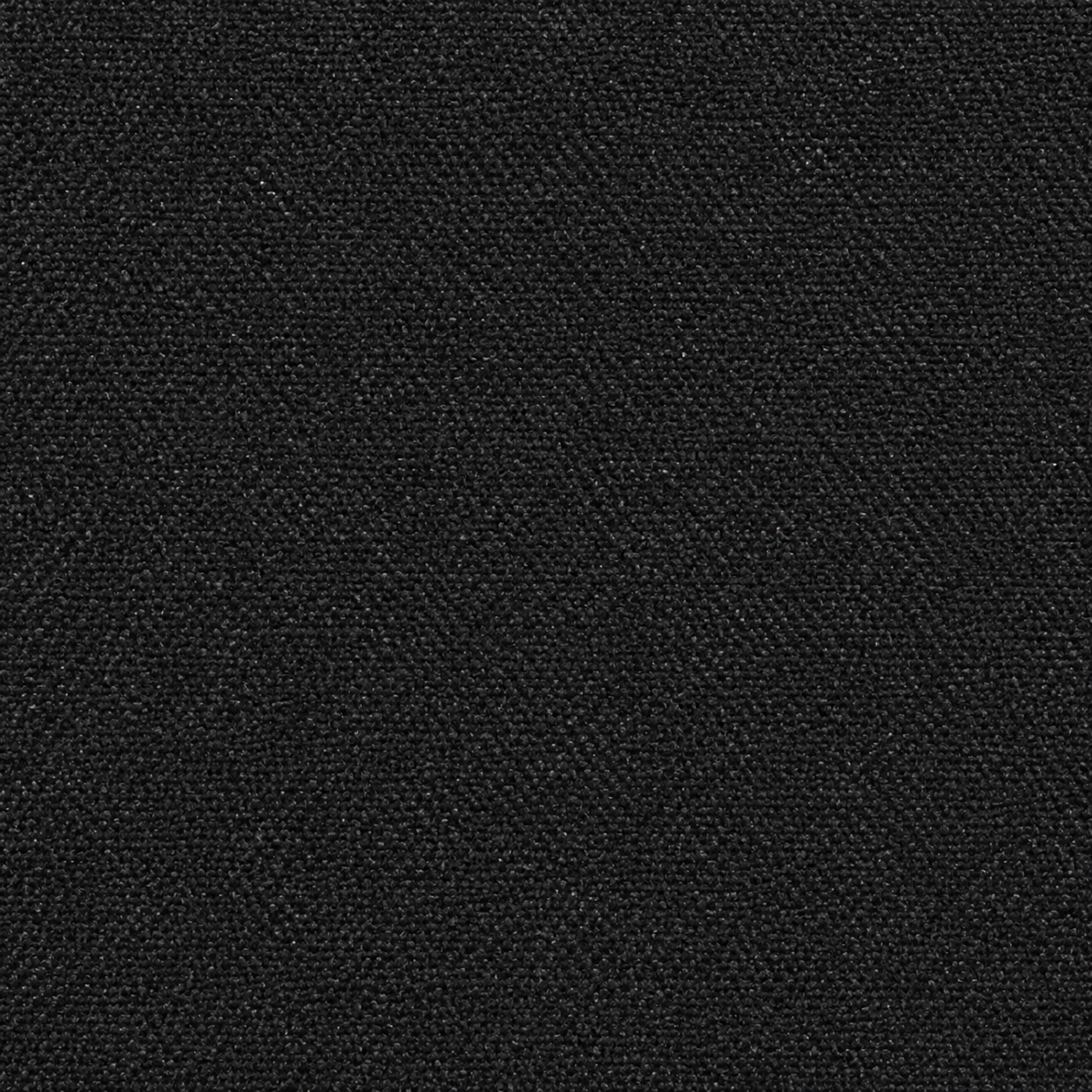 A close-up texture shot of a black woven fabric, showing the fine diagonal weave pattern.