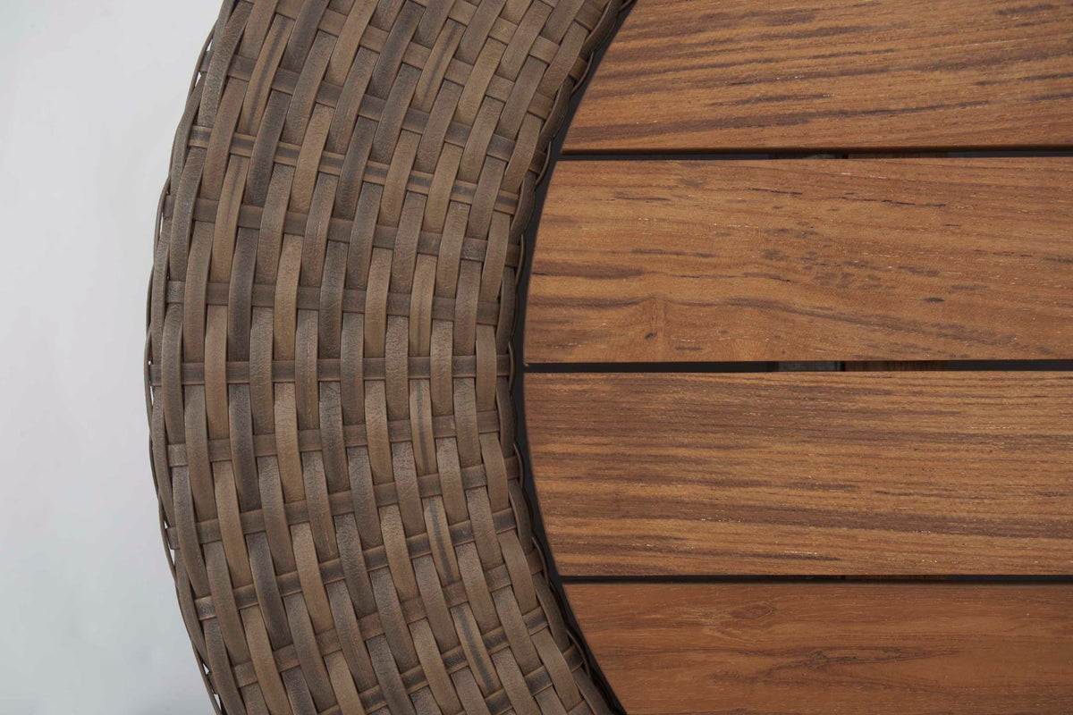 Close-up of a woven table top and wooden surface on a white background