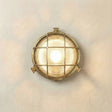 Grand cabin bulkhead outdoor wall light in raw brass on a neutral wall