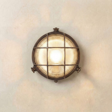 Grand cabin bulkhead outdoor wall light in antique brass on a neutral wall