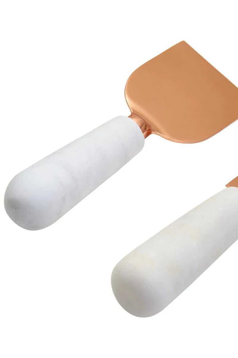 Close-up of the white marble handles on the Loxley cheese knives.