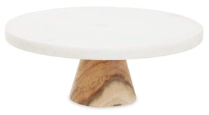 The Loxley Round Cake Stand with a white marble top on a tapered acacia wood pedestal.