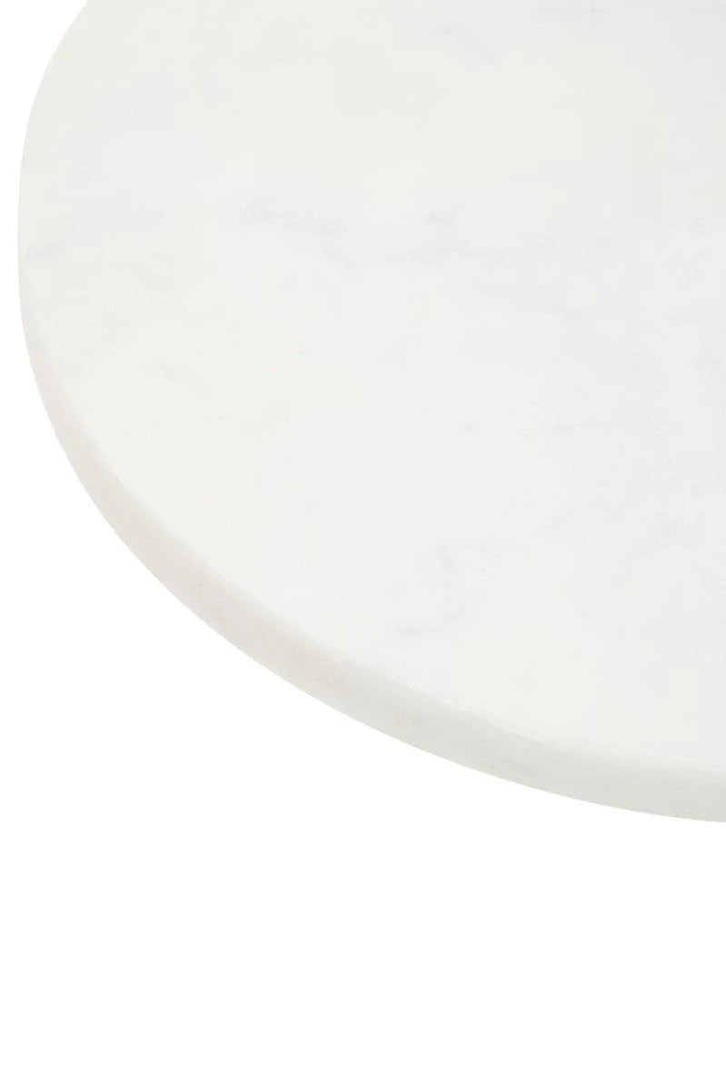 Close-up of the smooth white marble top of the Loxley Round Cake Stand, showing its soft veining.