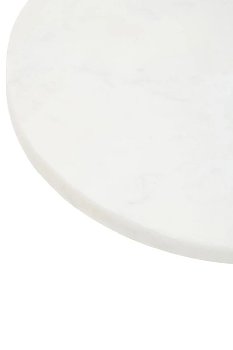 Close-up of the smooth white marble top of the Loxley Round Cake Stand, showing its soft veining.