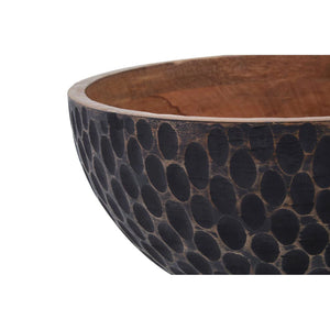 Close-up of the carved dimpled exterior on the Hewn mango wood bowl