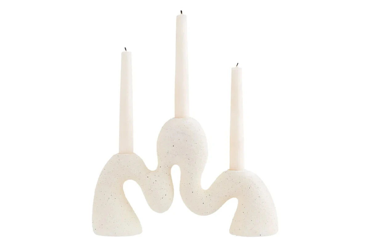 Soren Cream Organic Candle Holder, a cream textured candle holder with an undulating wave-like shape that holds three candles.