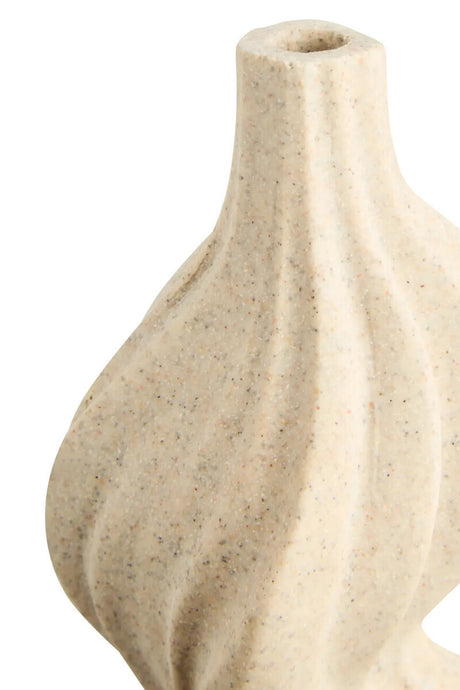 Close up of the top of a beige textured vase on a white background