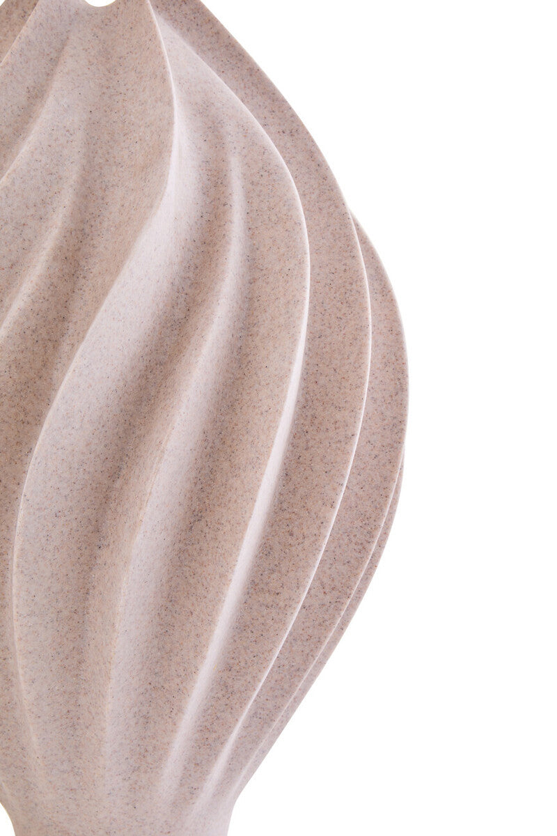 Close-up of a textured beige ceramic vase on a white background