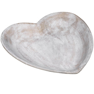 Shallow heart-shaped dish in a whitewashed grey stone-effect finish, on a white background