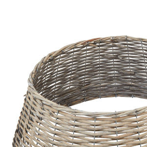 Close-up of the woven wicker weave and bound rim of the tree skirt