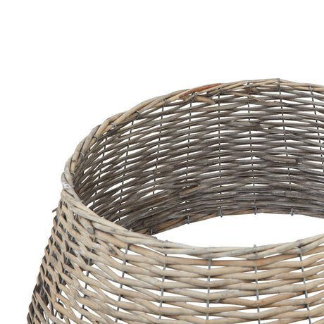 Close-up of the woven wicker weave and bound rim of the tree skirt