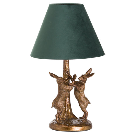 Antique Gold Marching Hares Lamp with green velvet shade, nature-inspired