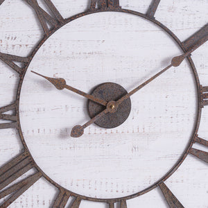Close-up of the aged metal hands, textured centre plate and distressed white wood on the Rustic Wooden Clock