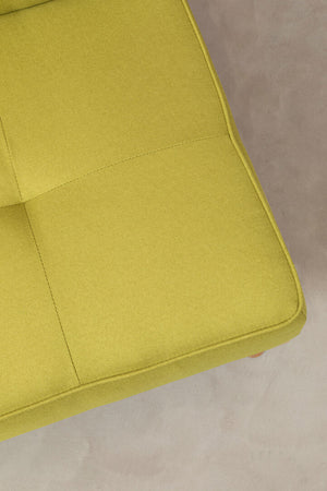 Lime green fabric on a neutral floor