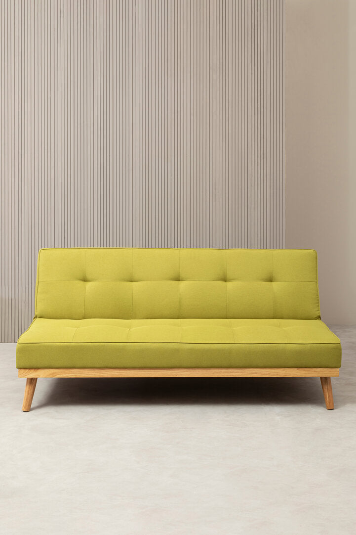 Lime green fabric sofa bed on a neutral background