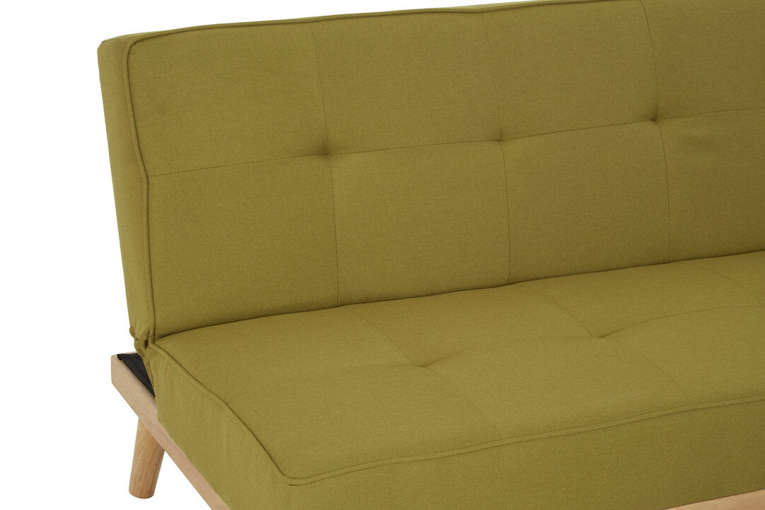 Green fabric sofa bed on a white background