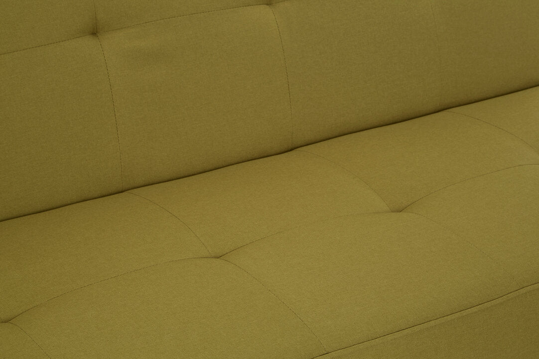 Close up of a lime green sofa bed