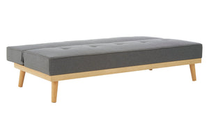 Gray upholstered flat sofa bed with wooden legs on a white background