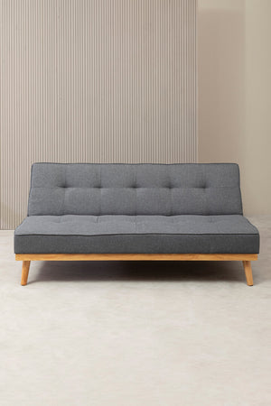 Front view of a grey sofa bed with wooden legs on a neutral background