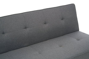 Gray upholstered headboard with tufted design on a white background