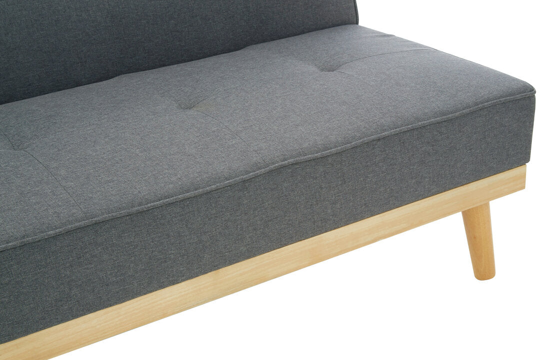 Gray fabric sofa with wooden legs on a white background