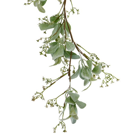Close-up of the lambs ear leaves and white wax flowers on the garland