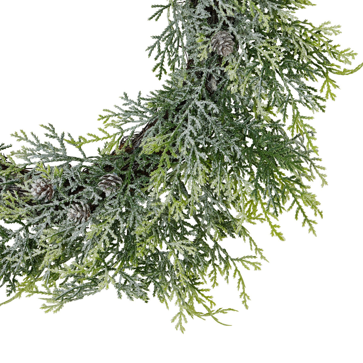 Close-up of the frosted pine needles and pinecones on the wreath