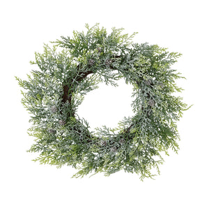 Frosted Pine Wreath With Pinecones, a round faux pine wreath with frosted tips and brown pinecones