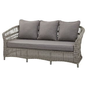 Wicker outdoor sofa with grey cushions on a white background