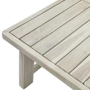 Wooden table with a light grey finish on a white background