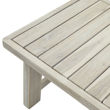 Wooden table with a light grey finish on a white background