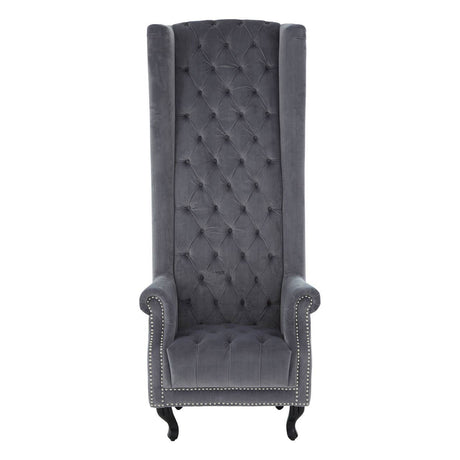 Gray tufted chair with high back and armrests on a white background