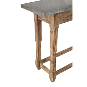Close-up of the distressed wood legs and stretchers on the Hatherley console table