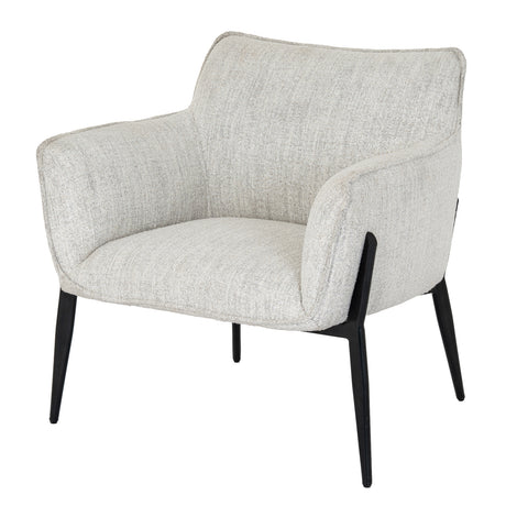 A neutral armchair with black legs on a white background