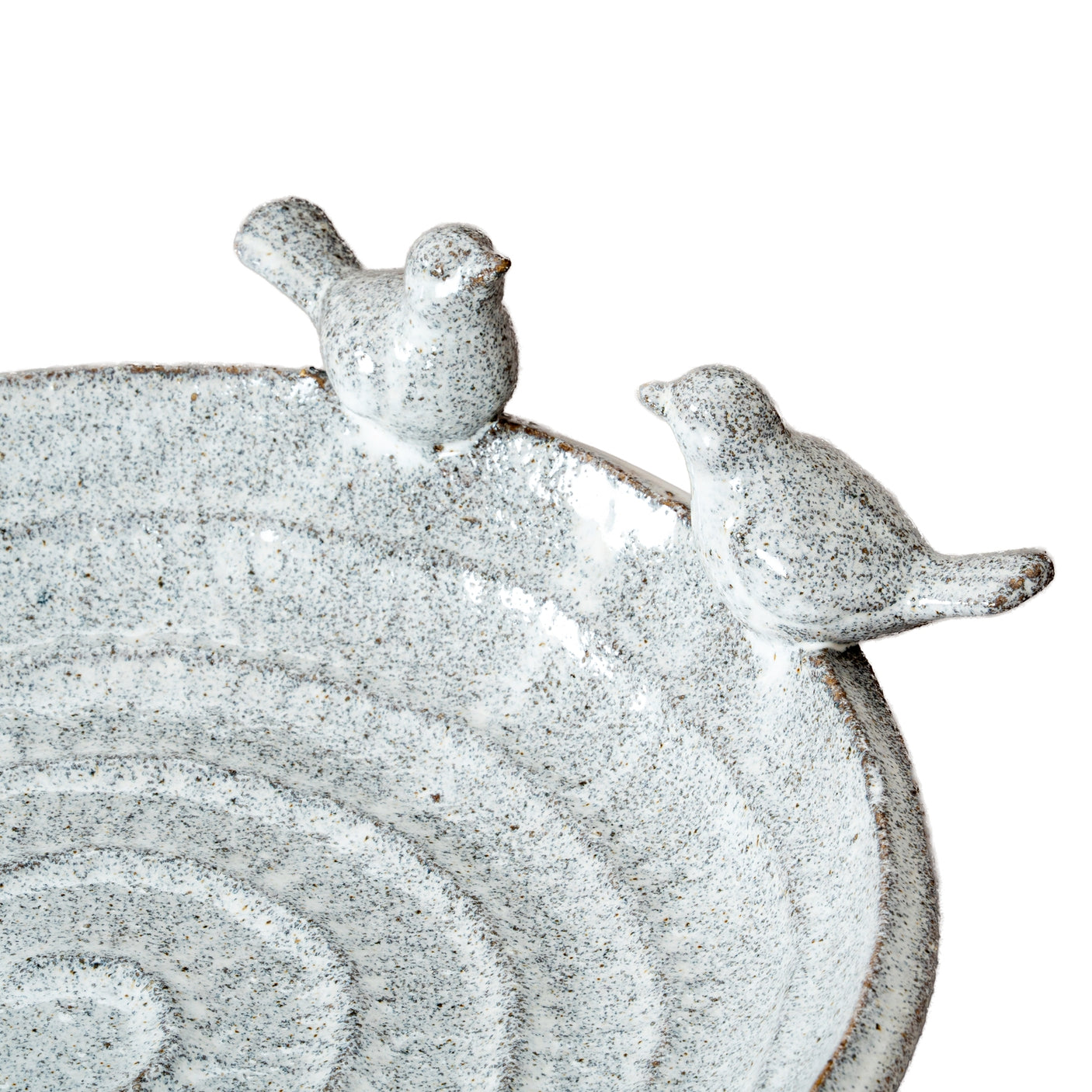 Ceramic bird bath with two bird figures on a white background