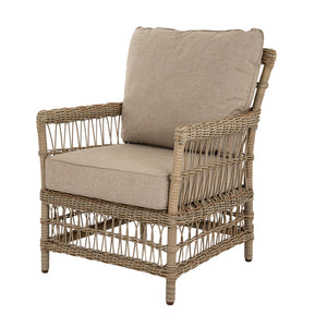 Wicker armchair with beige cushions on a white background